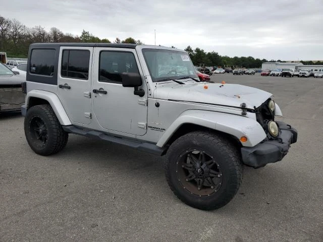 Photo 3 VIN: 1J4HA5H13BL632660 - JEEP WRANGLER U 