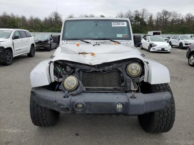 Photo 4 VIN: 1J4HA5H13BL632660 - JEEP WRANGLER U 