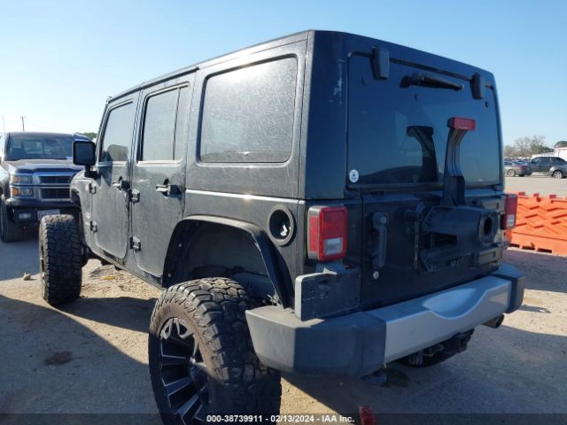 Photo 2 VIN: 1J4HA5H14BL576714 - JEEP WRANGLER UNLIMITED 