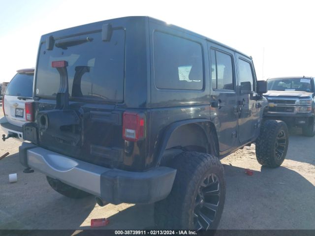 Photo 3 VIN: 1J4HA5H14BL576714 - JEEP WRANGLER UNLIMITED 