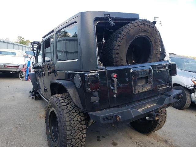 Photo 2 VIN: 1J4HA5H14BL633283 - JEEP WRANGLER U 