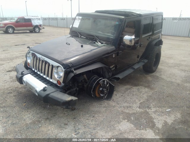 Photo 5 VIN: 1J4HA5H16BL506826 - JEEP WRANGLER UNLIMITED 