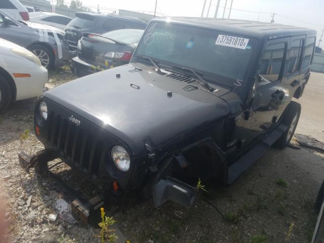 Photo 1 VIN: 1J4HA5H16BL564855 - JEEP WRANGLER U 