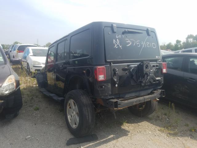 Photo 2 VIN: 1J4HA5H16BL564855 - JEEP WRANGLER U 