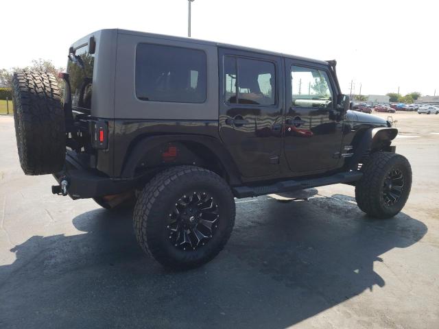 Photo 2 VIN: 1J4HA5H17AL156590 - JEEP WRANGLER UNLIMITED 