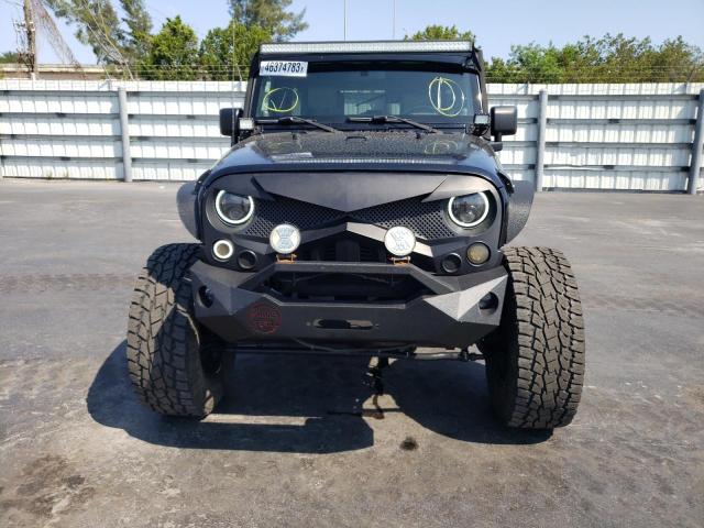 Photo 4 VIN: 1J4HA5H17AL156590 - JEEP WRANGLER UNLIMITED 