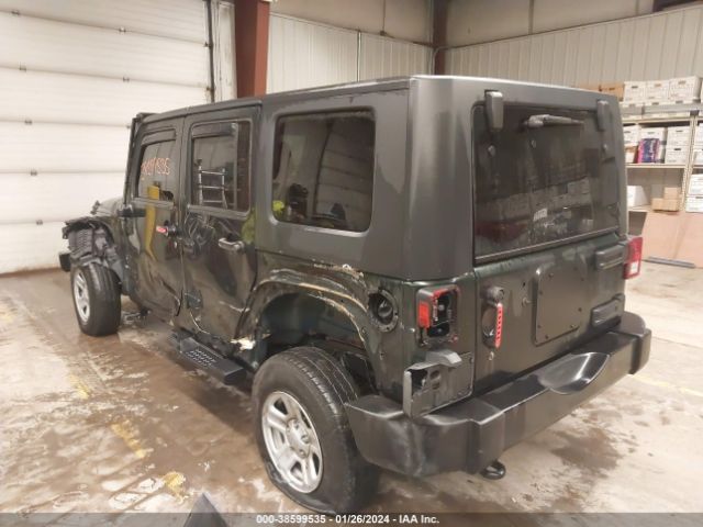 Photo 2 VIN: 1J4HA5H18AL125784 - JEEP WRANGLER UNLIMITED 