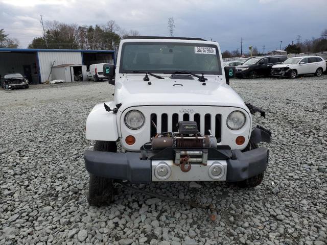 Photo 4 VIN: 1J4HA5H18BL633416 - JEEP WRANGLER U 