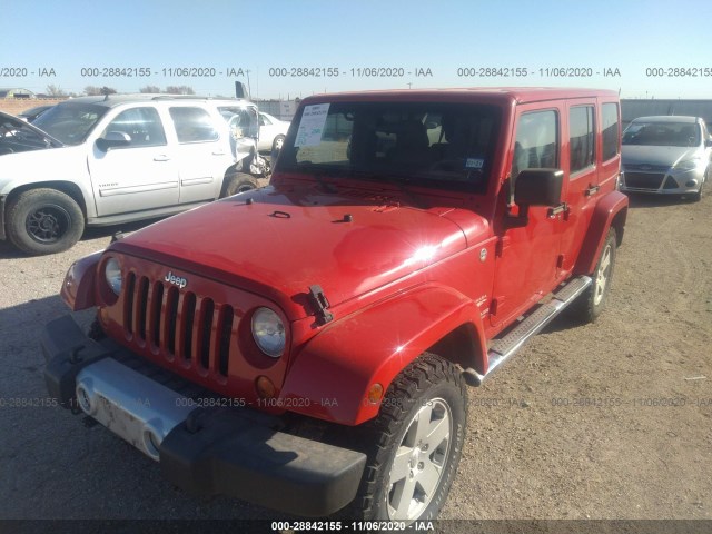 Photo 5 VIN: 1J4HA5H19BL618066 - JEEP WRANGLER UNLIMITED 