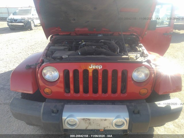 Photo 9 VIN: 1J4HA5H19BL618066 - JEEP WRANGLER UNLIMITED 