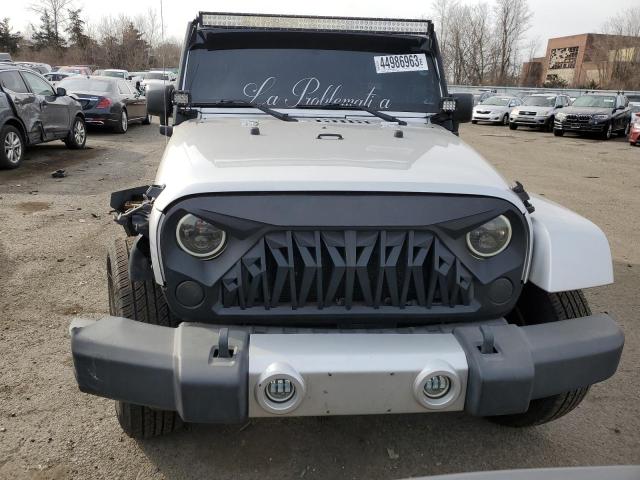 Photo 4 VIN: 1J4HA5H1XBL619288 - JEEP WRANGLER U 