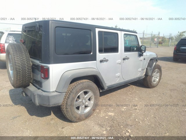 Photo 3 VIN: 1J4HA6H10BL589143 - JEEP WRANGLER UNLIMITED 