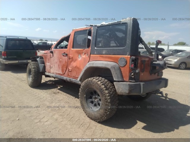 Photo 2 VIN: 1J4HA6H10BL615093 - JEEP WRANGLER UNLIMITED 