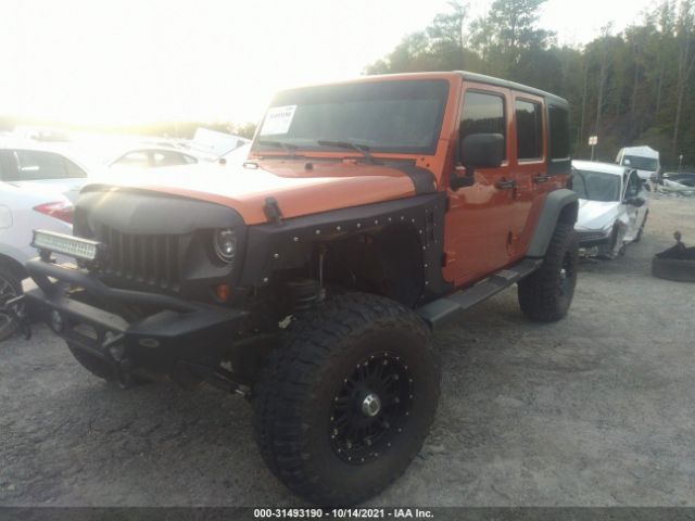 Photo 1 VIN: 1J4HA6H11BL579978 - JEEP WRANGLER UNLIMITED 