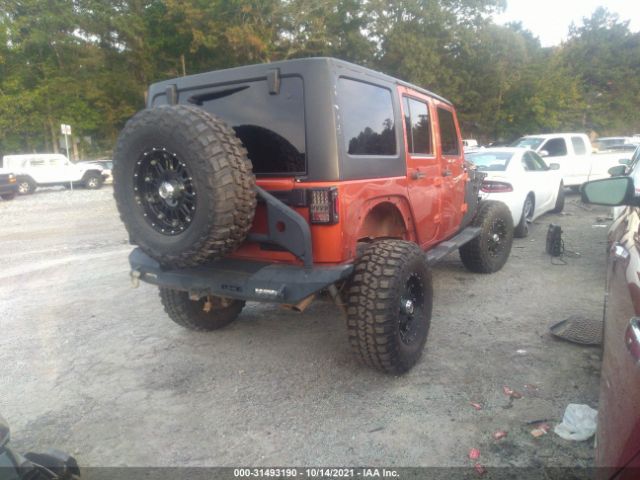 Photo 3 VIN: 1J4HA6H11BL579978 - JEEP WRANGLER UNLIMITED 