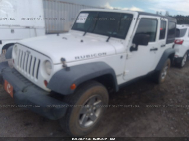 Photo 1 VIN: 1J4HA6H12BL582985 - JEEP WRANGLER UNLIMITED 