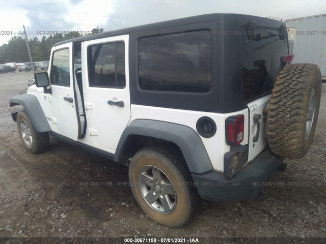 Photo 2 VIN: 1J4HA6H12BL582985 - JEEP WRANGLER UNLIMITED 