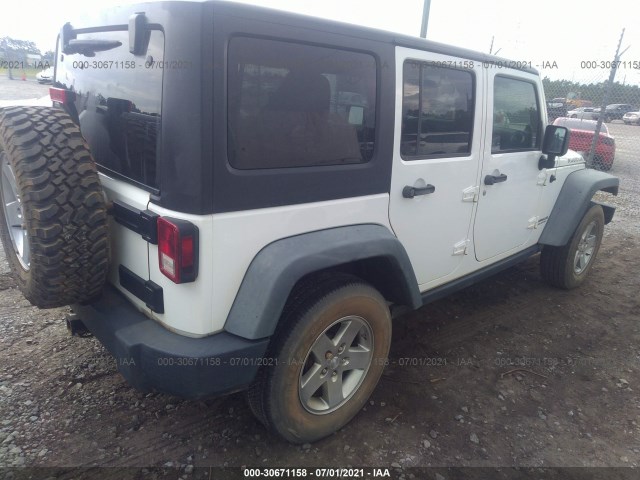 Photo 3 VIN: 1J4HA6H12BL582985 - JEEP WRANGLER UNLIMITED 