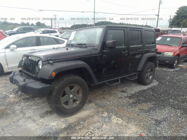 Photo 1 VIN: 1J4HA6H16BL567809 - JEEP WRANGLER UNLIMITED 