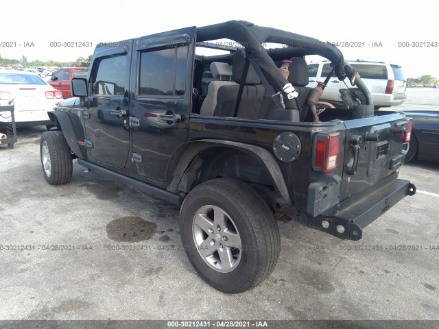 Photo 2 VIN: 1J4HA6H19BL615819 - JEEP WRANGLER UNLIMITED 