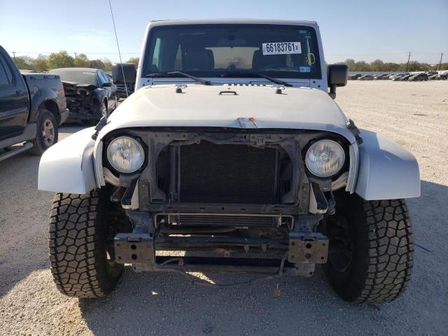 Photo 8 VIN: 1J4HA7H11BL581669 - JEEP WRANGLER U 