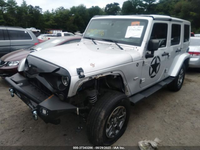 Photo 1 VIN: 1J4HA7H13BL581768 - JEEP WRANGLER UNLIMITED 