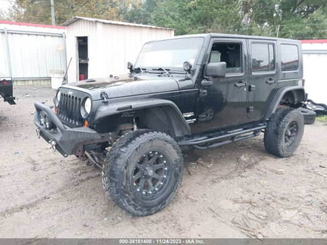 Photo 1 VIN: 1J4HB5H12AL200248 - JEEP WRANGLER UNLIMITED 