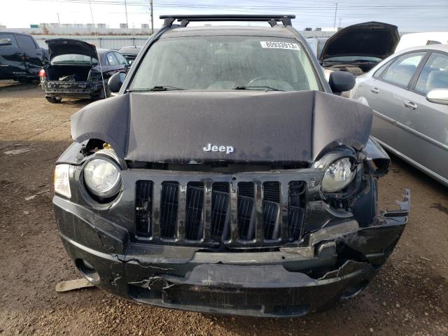 Photo 4 VIN: 1J4NF1FB1AD629192 - JEEP COMPASS 