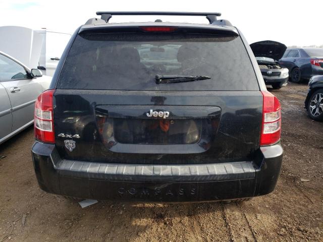 Photo 5 VIN: 1J4NF1FB1AD629192 - JEEP COMPASS 