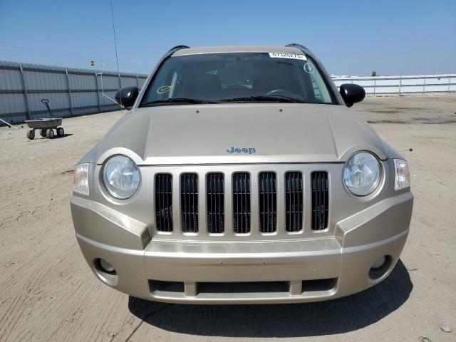 Photo 4 VIN: 1J4NF1FB1AD642976 - JEEP COMPASS 