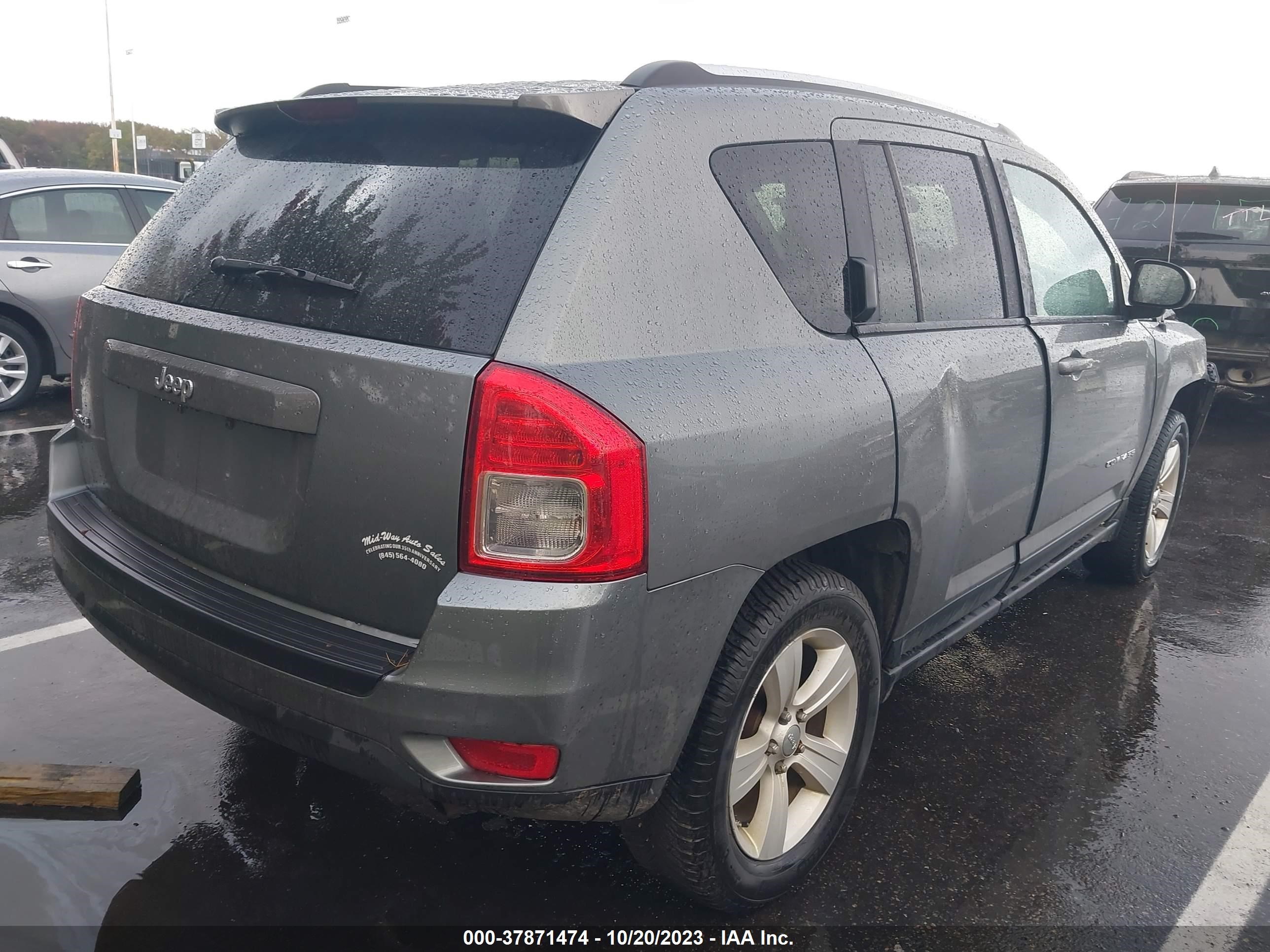 Photo 3 VIN: 1J4NF1FB1BD206940 - JEEP COMPASS 