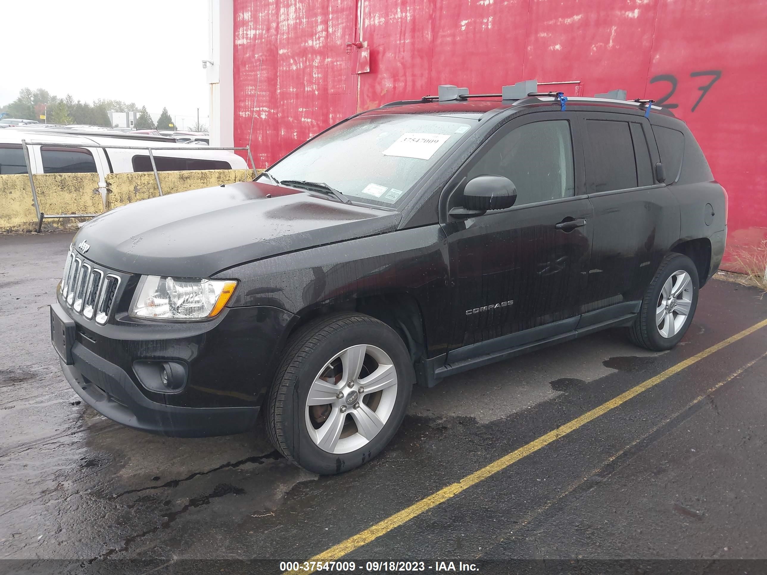 Photo 1 VIN: 1J4NF1FB2BD193938 - JEEP COMPASS 