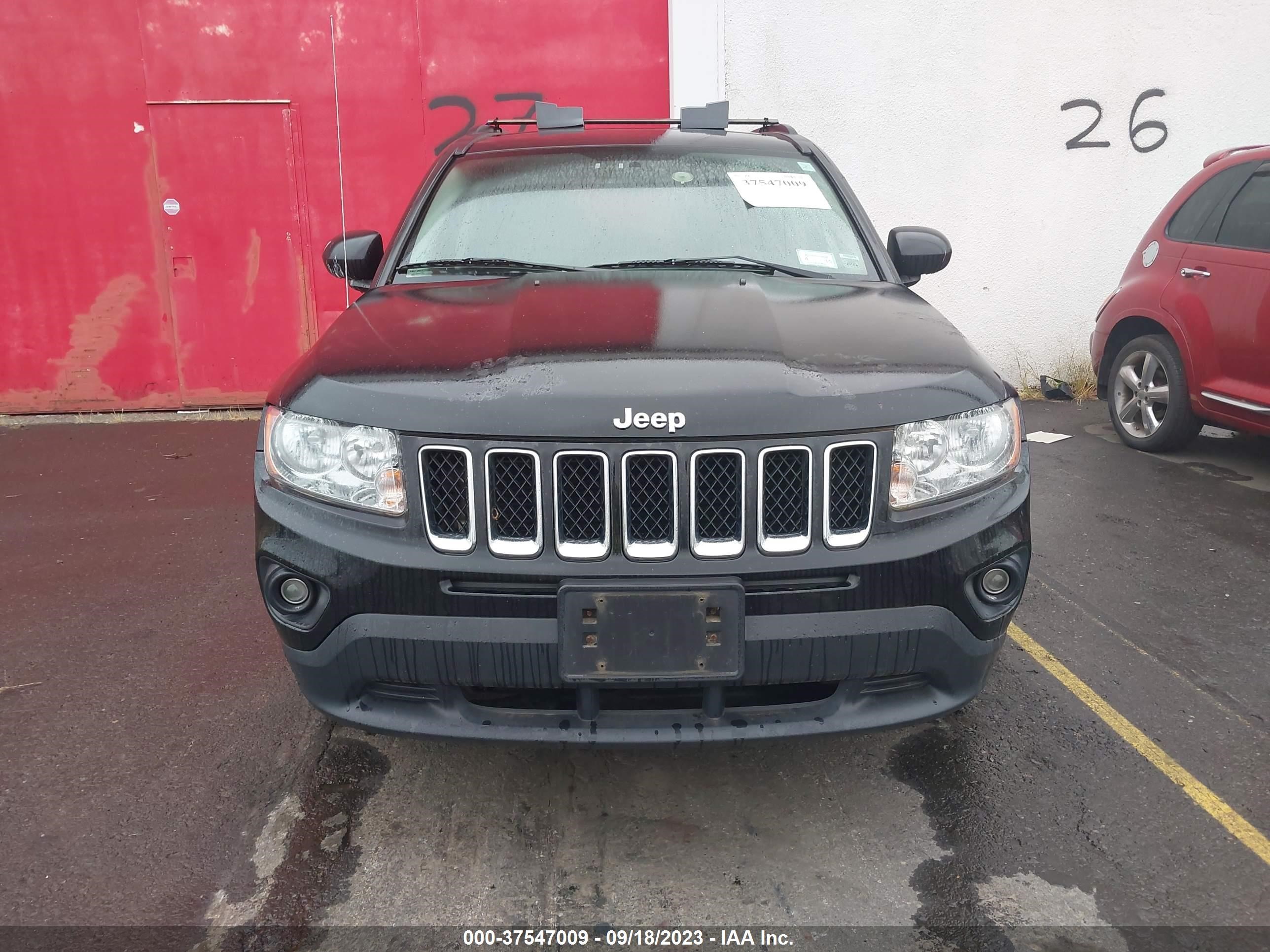 Photo 5 VIN: 1J4NF1FB2BD193938 - JEEP COMPASS 