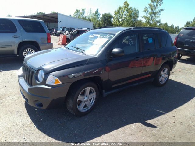 Photo 1 VIN: 1J4NF1FB4AD666074 - JEEP COMPASS 