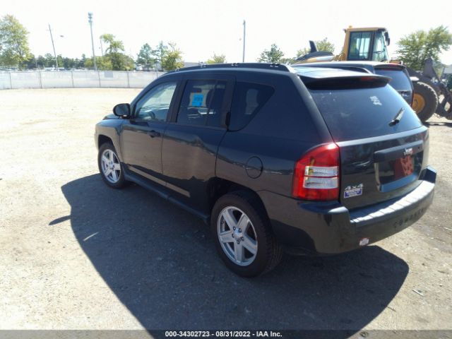 Photo 2 VIN: 1J4NF1FB4AD666074 - JEEP COMPASS 