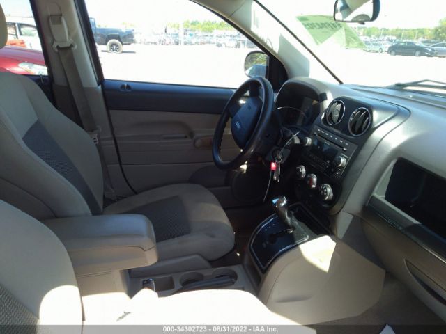 Photo 4 VIN: 1J4NF1FB4AD666074 - JEEP COMPASS 