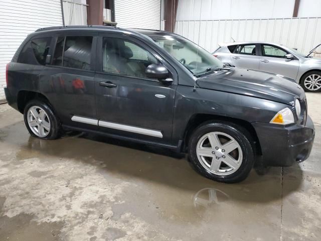 Photo 3 VIN: 1J4NF1FB4AD675034 - JEEP COMPASS 