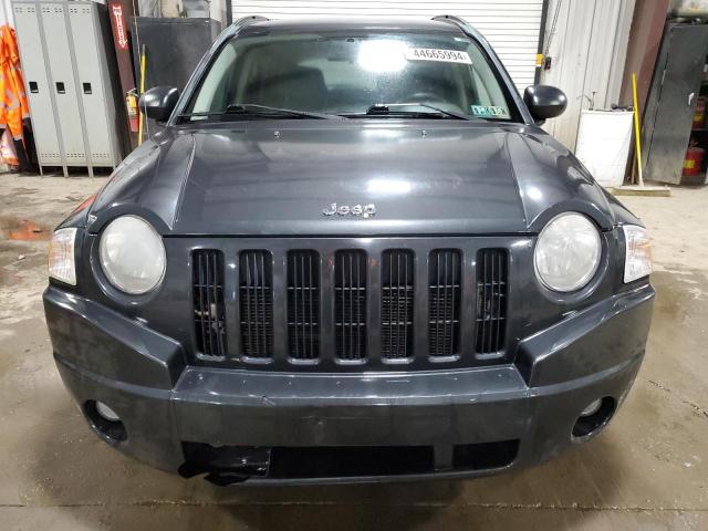 Photo 4 VIN: 1J4NF1FB4AD675034 - JEEP COMPASS 