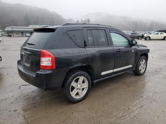 Photo 2 VIN: 1J4NF1FB5AD671543 - JEEP COMPASS 