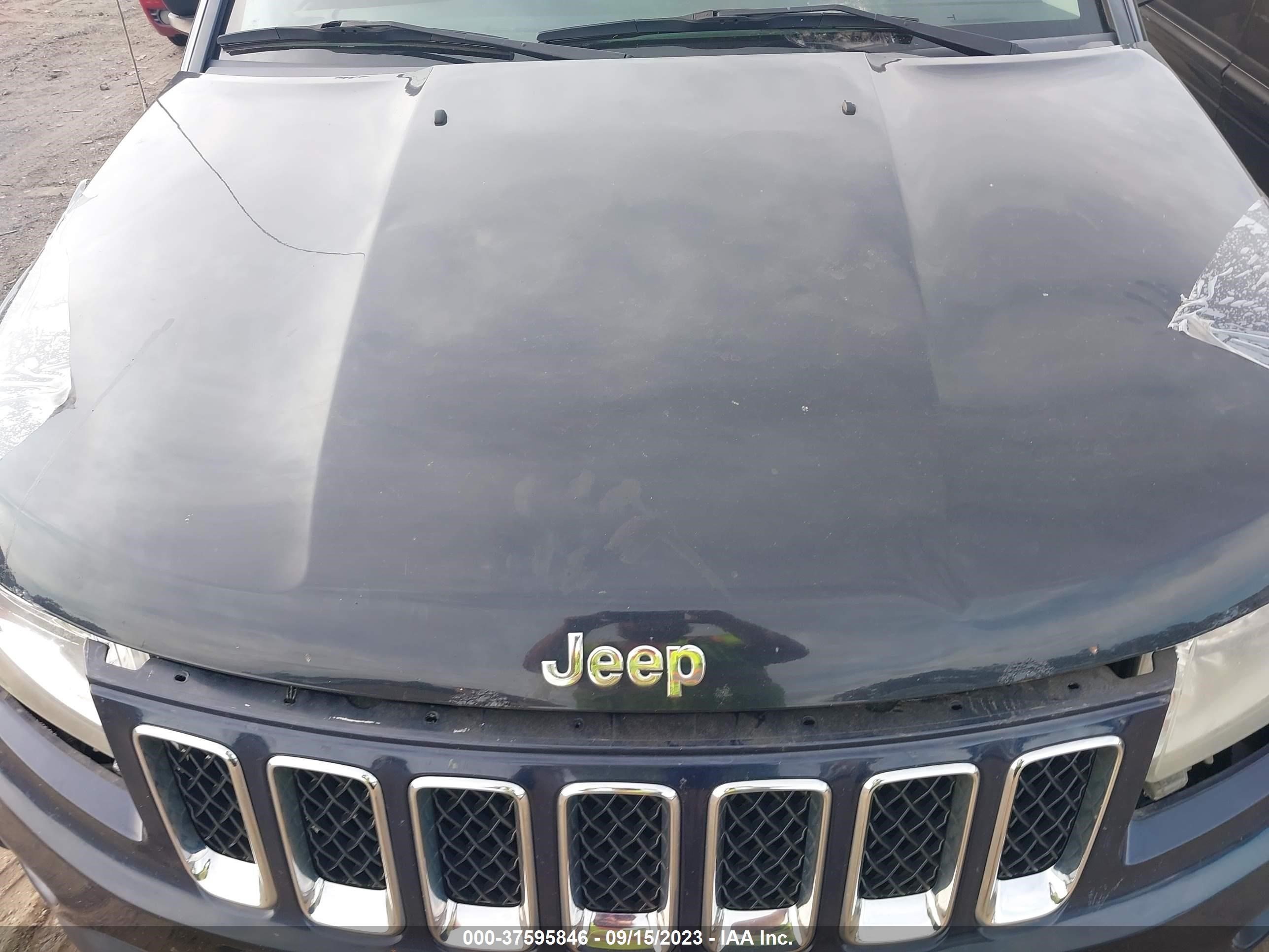 Photo 9 VIN: 1J4NF1FB9BD194018 - JEEP COMPASS 