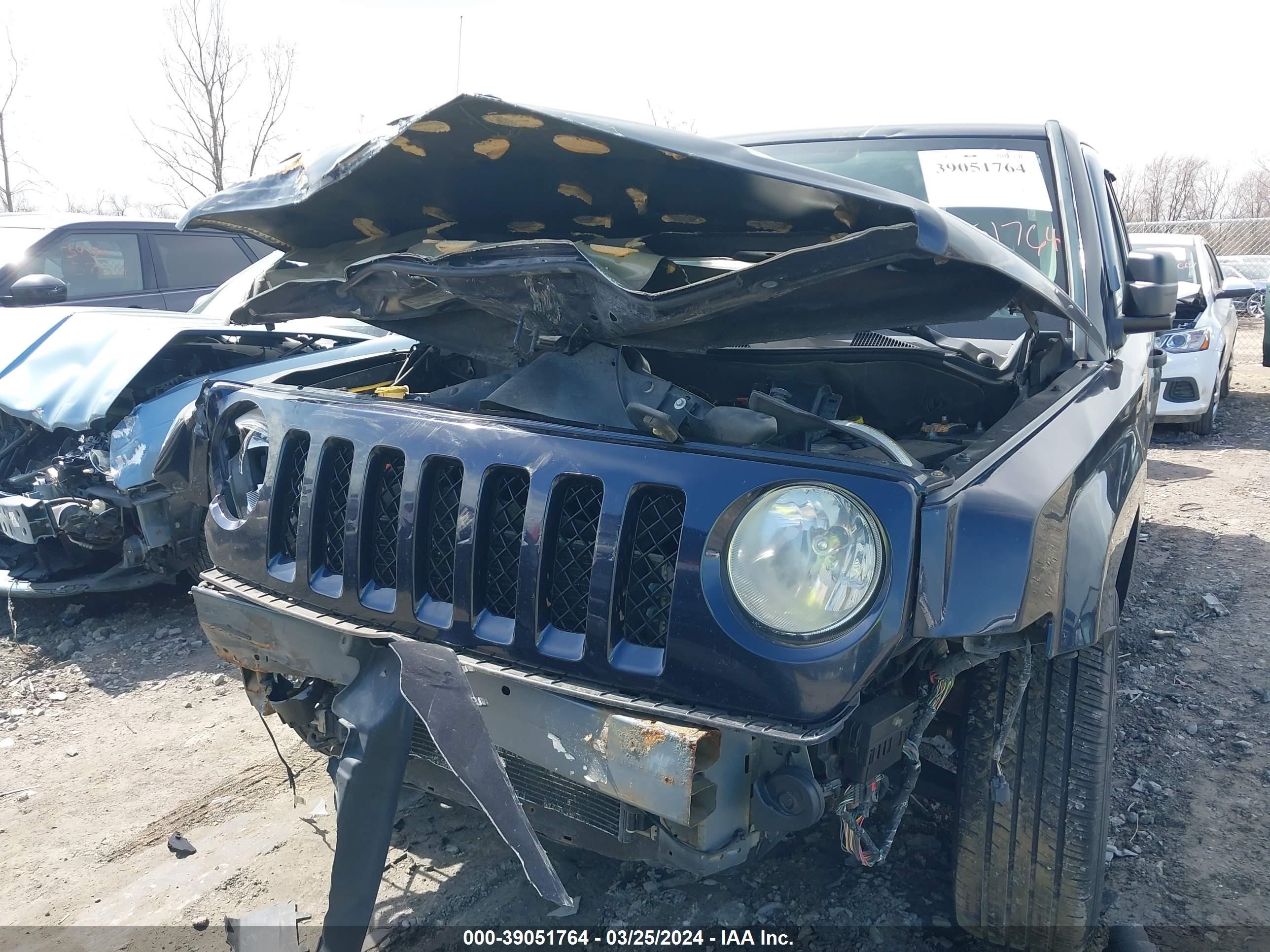 Photo 5 VIN: 1J4NF1GB9BD100671 - JEEP LIBERTY (PATRIOT) 