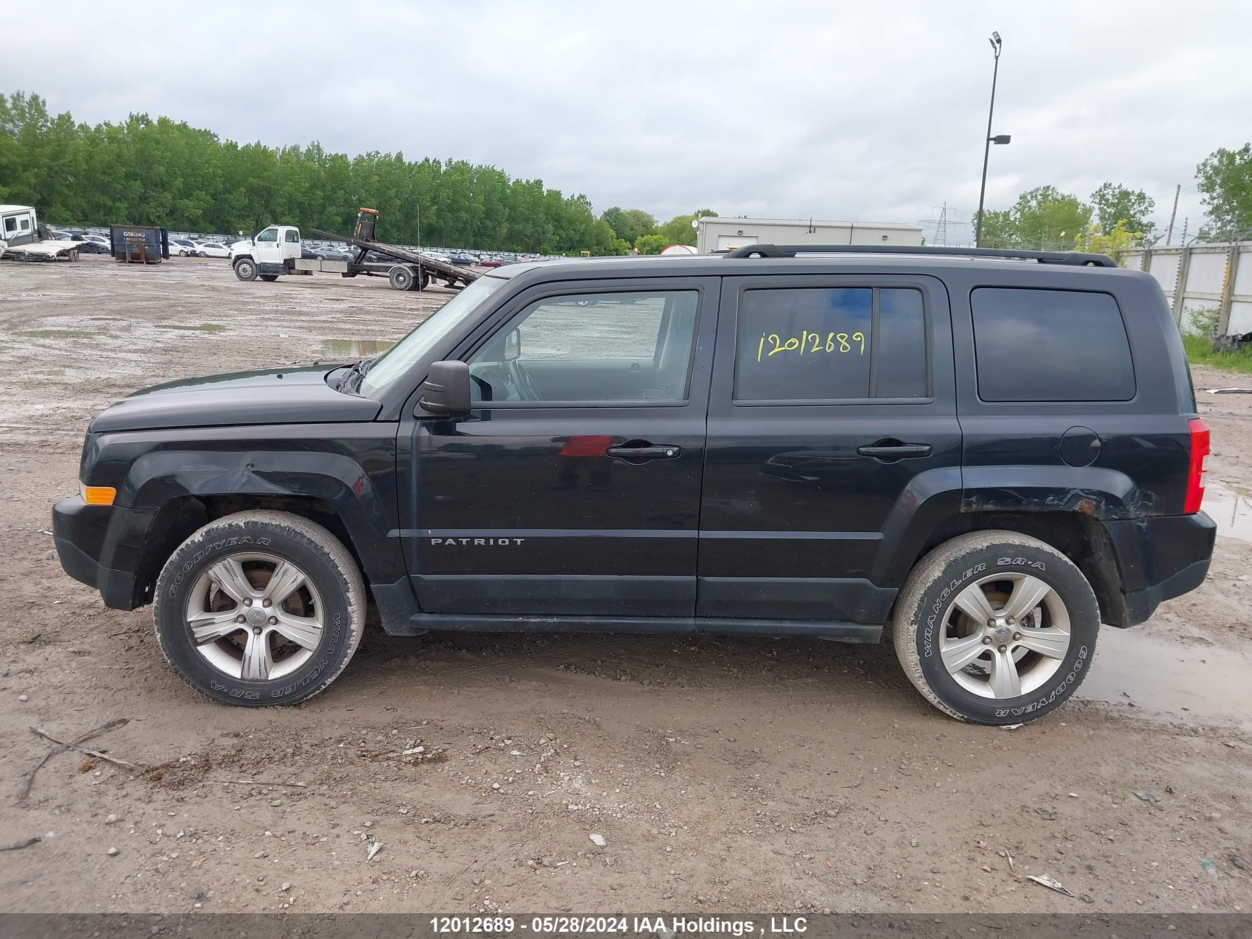 Photo 13 VIN: 1J4NF2GB0BD104873 - JEEP LIBERTY (PATRIOT) 