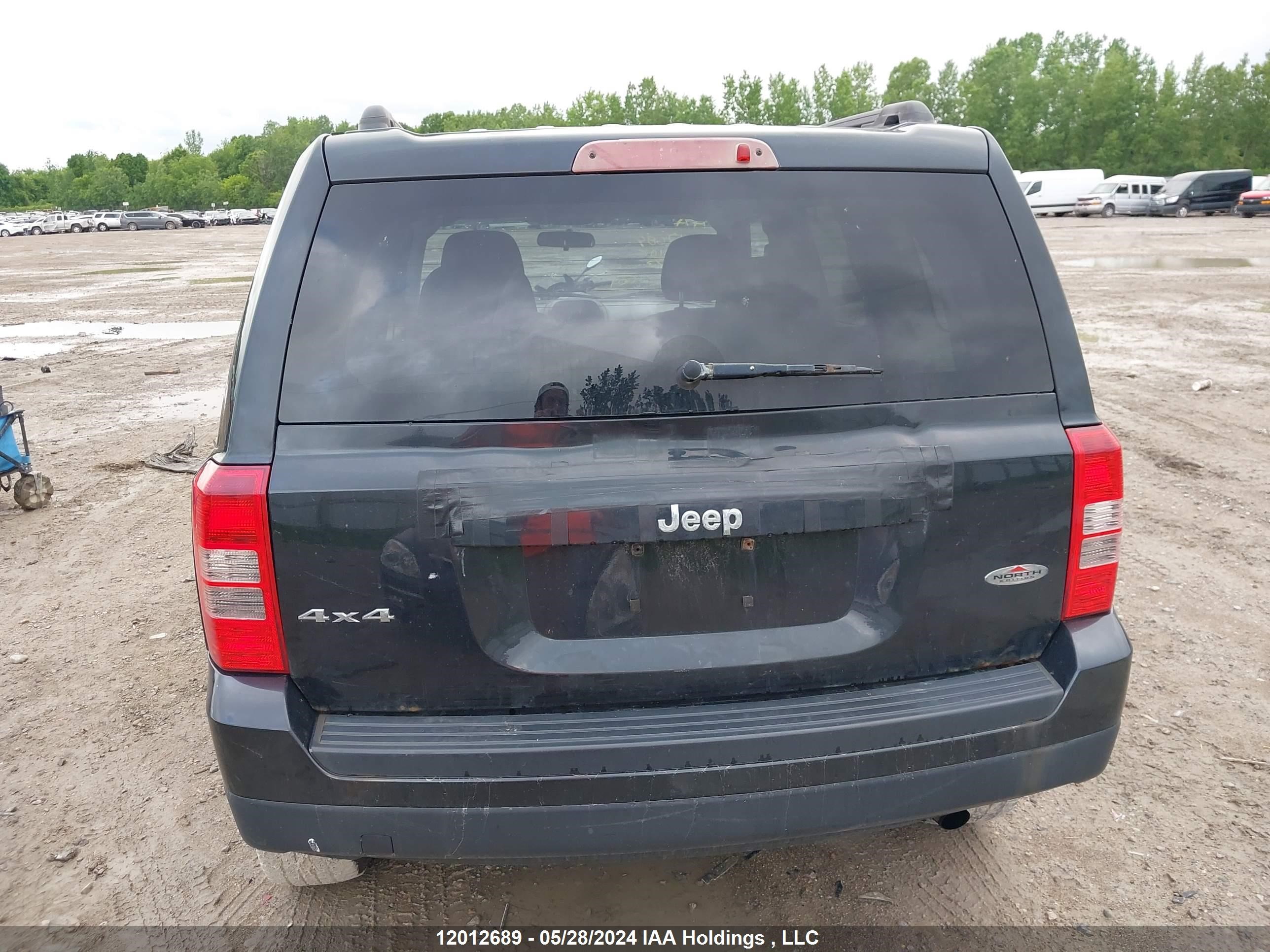 Photo 15 VIN: 1J4NF2GB0BD104873 - JEEP LIBERTY (PATRIOT) 