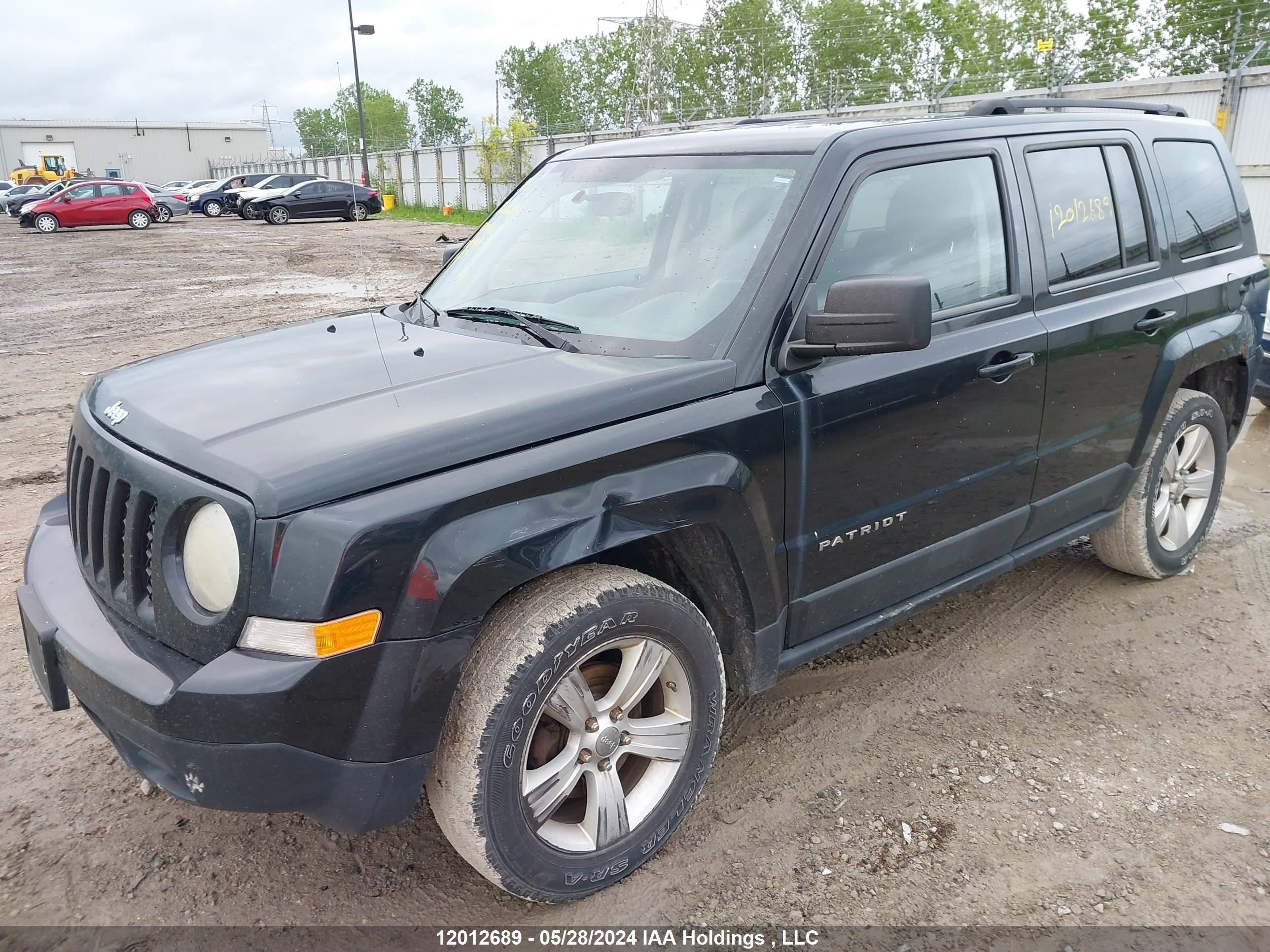 Photo 5 VIN: 1J4NF2GB0BD104873 - JEEP LIBERTY (PATRIOT) 