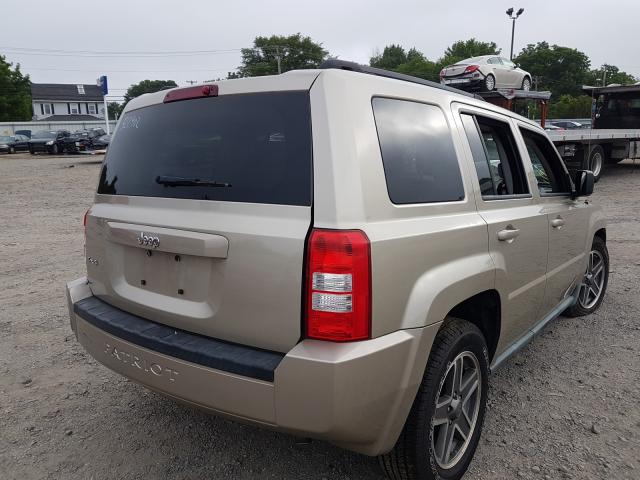 Photo 3 VIN: 1J4NF2GB2AD522902 - JEEP PATRIOT SP 