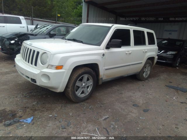 Photo 1 VIN: 1J4NF2GBXAD549118 - JEEP PATRIOT 