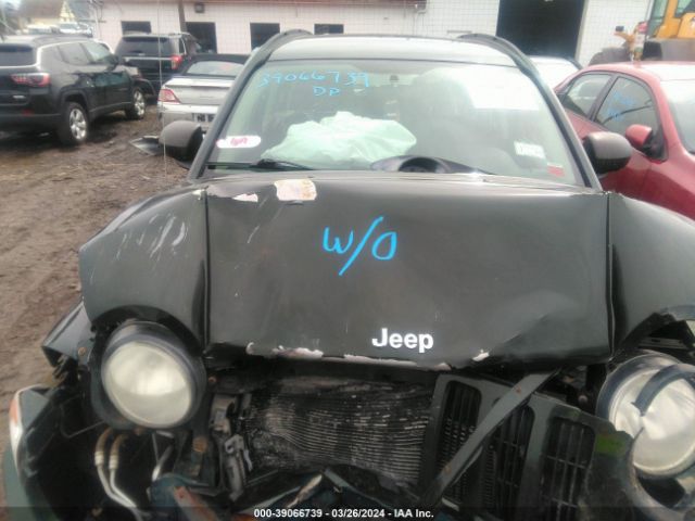 Photo 9 VIN: 1J4NF4FB1AD581971 - JEEP COMPASS 