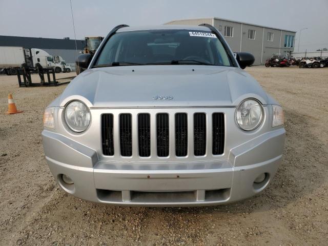 Photo 4 VIN: 1J4NF4FB1AD631140 - JEEP COMPASS 