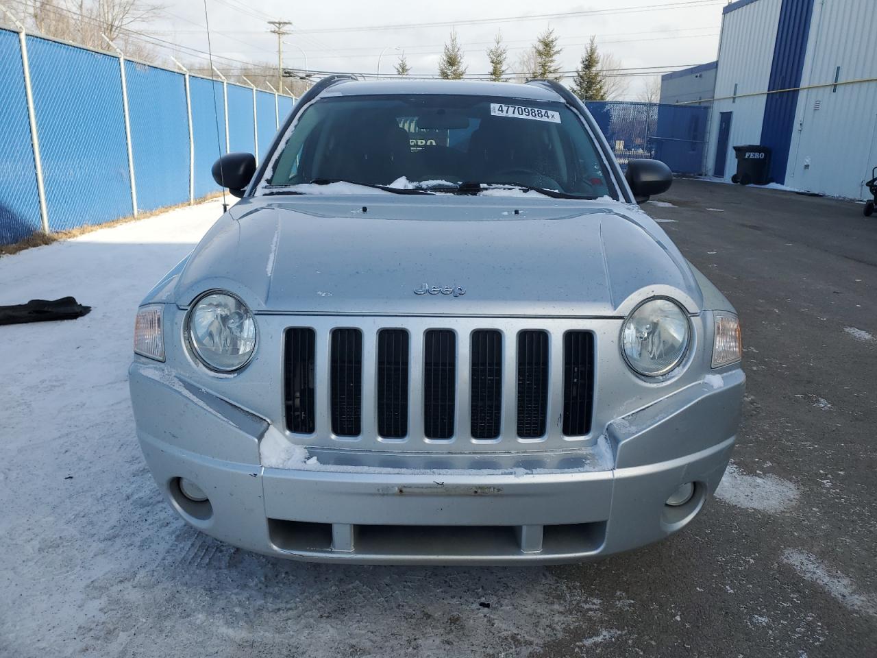 Photo 4 VIN: 1J4NF4FB4AD581074 - JEEP COMPASS 