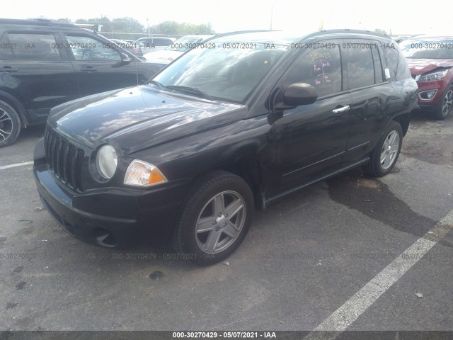 Photo 1 VIN: 1J4NF4FB4AD631438 - JEEP COMPASS 